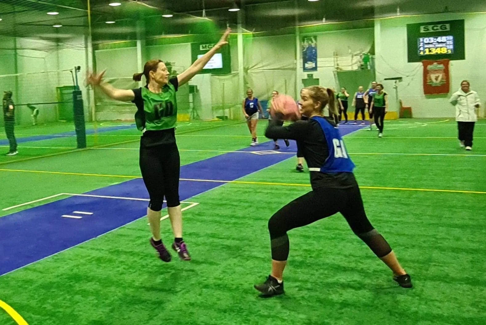 Netted indoor courts at Weston Indoor Sports during an adult netball game