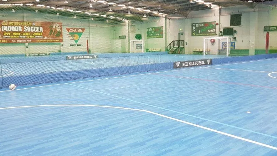 Empty blue futsal courts at Box Hill Action Indoor Sports