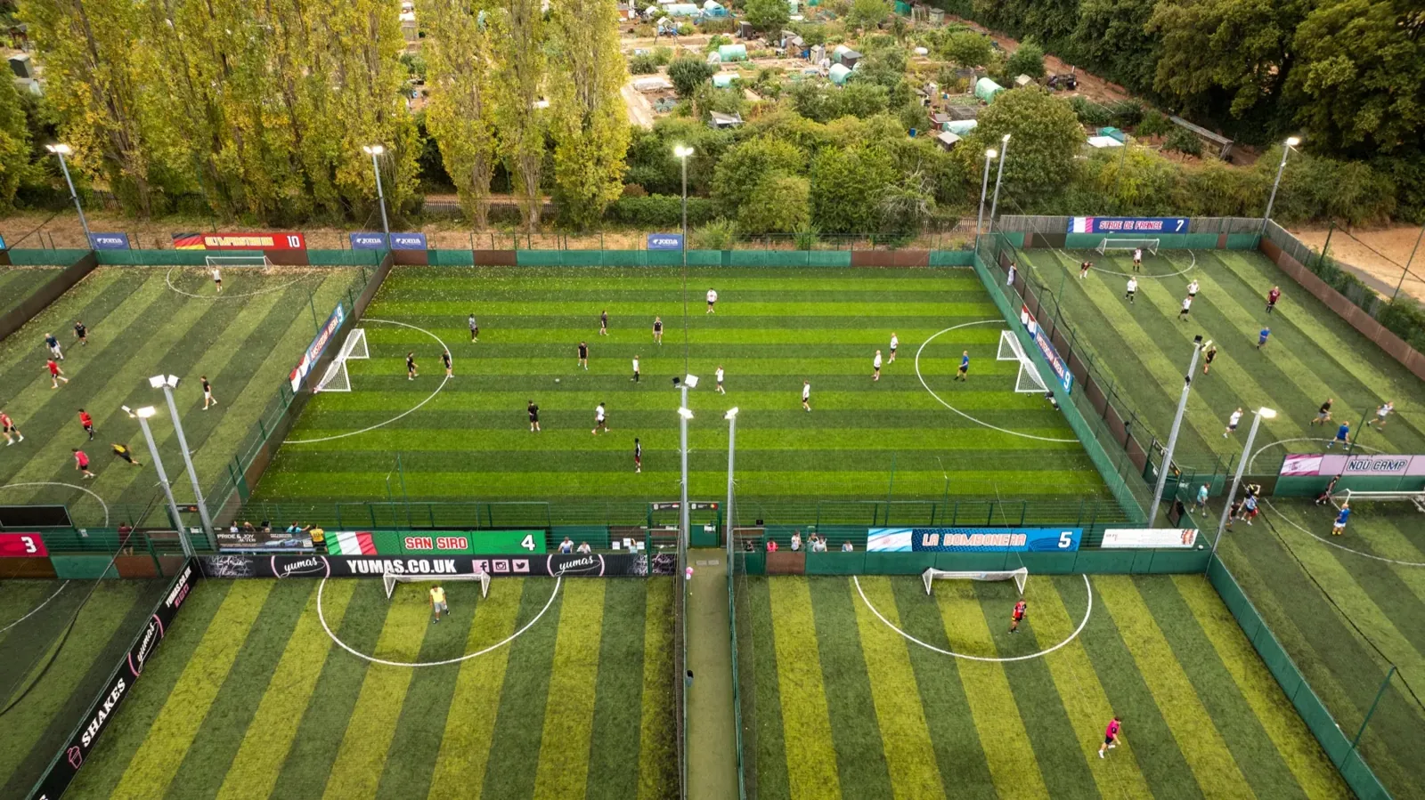 Aerial view of the floodlit pitches at GOALS Northampton